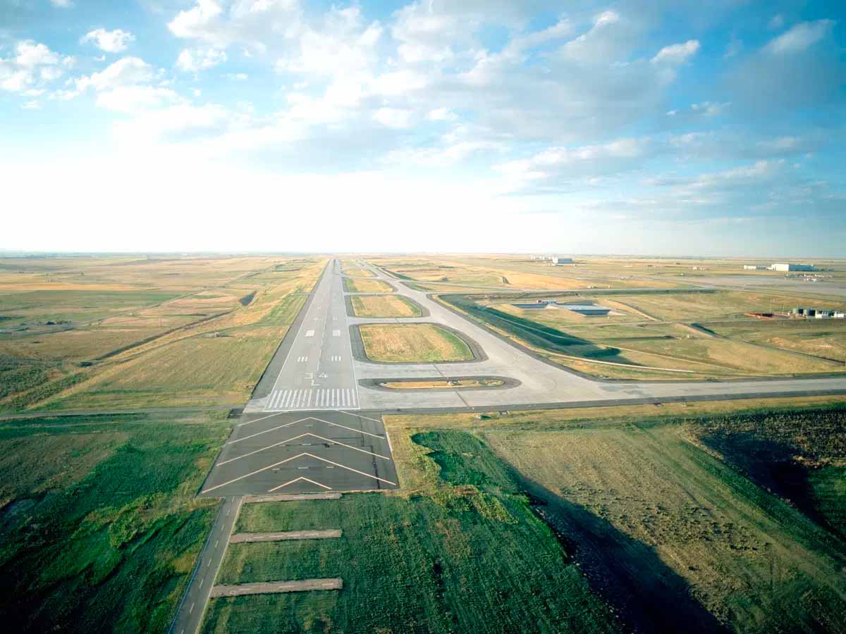 DIA International Runway 16R/34L Concrete Paving Finished Project