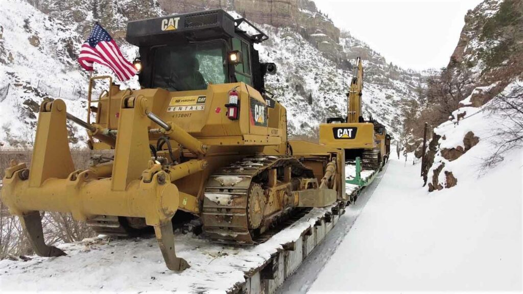 Transporting heavy machinery by rail to the Glenwood Canyon project