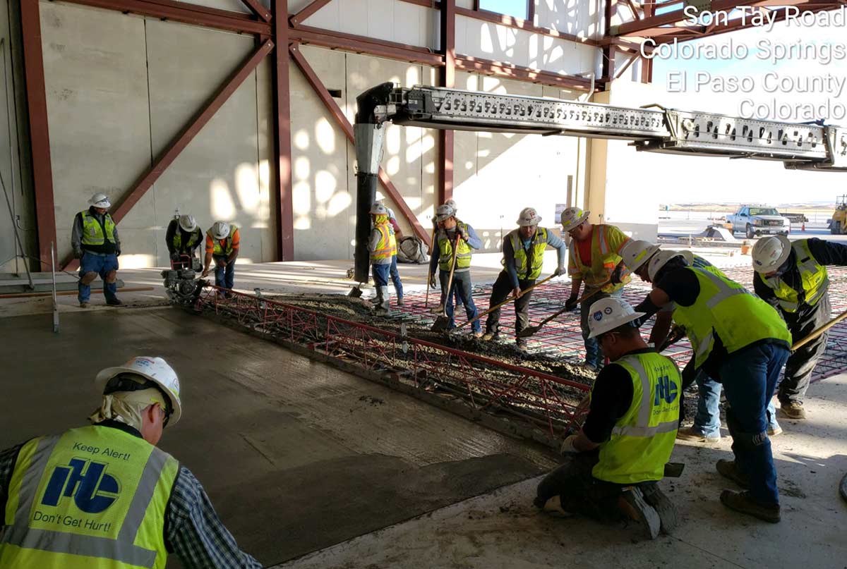 Busy paving pccp on the Attack Hanger Project at Fort Carson in Colorado